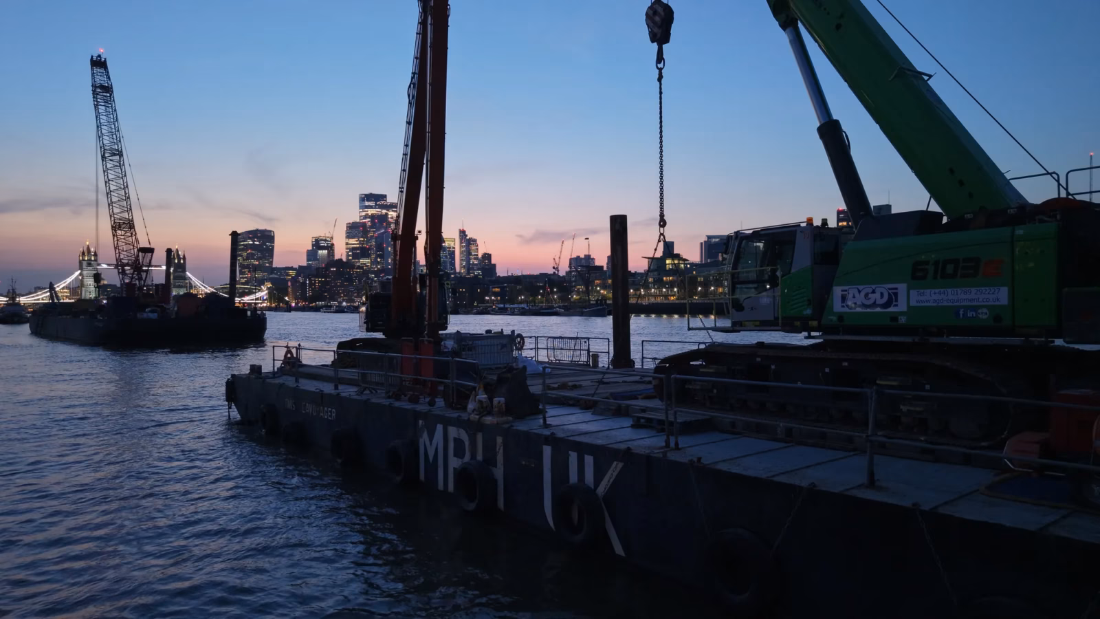 MPH UK spud-leg pontoon TMS Seavoyager with a Land & Water excavator carrying out marine works on the River Thames