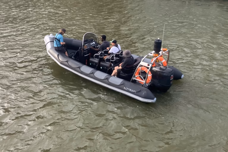 Our RIB on the Thames with the skipper at the helm and the drone crew aboard, heading out for an evening drone shoot