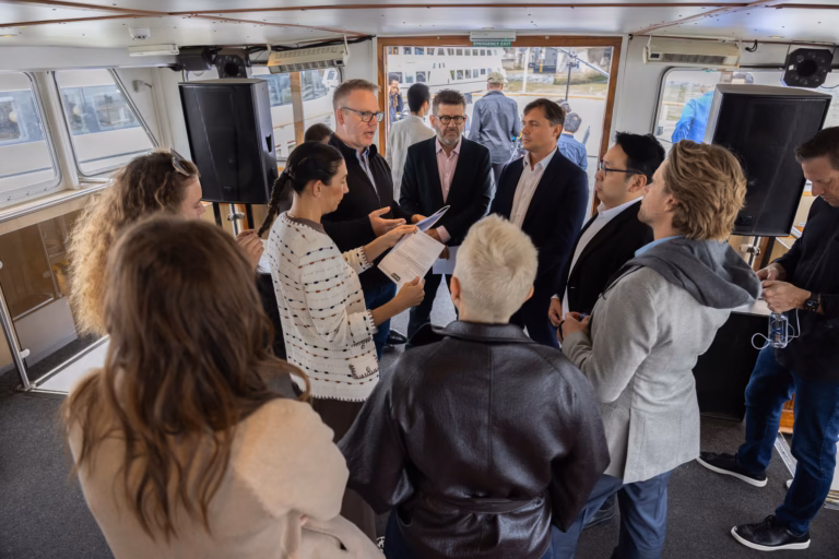 Briefing the contributors in the boat’s saloon before filming on the Thames